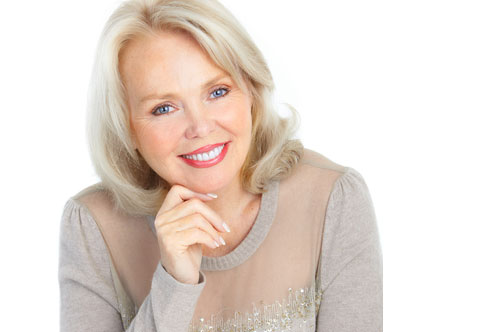 Restore Your Summer Smile Confidence With Dental Implants